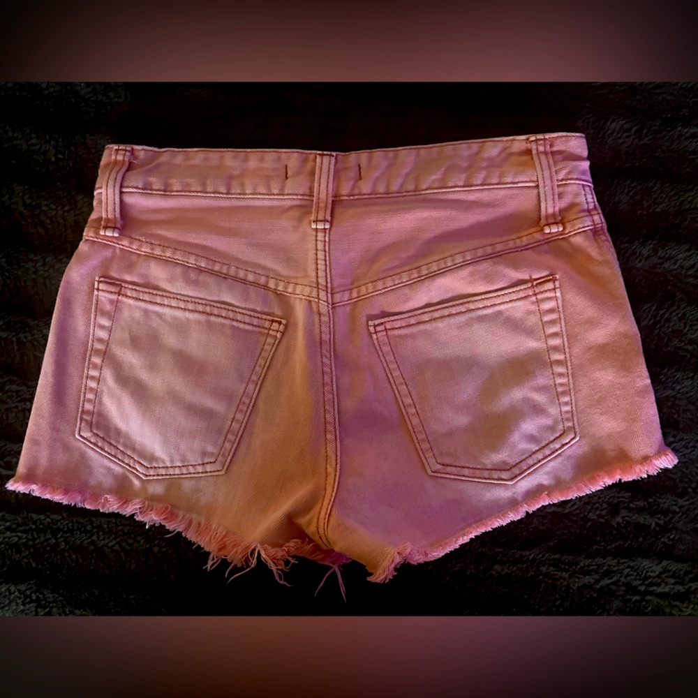 Free People distressed jean shorts size 25 in color salmon. Gently worn.